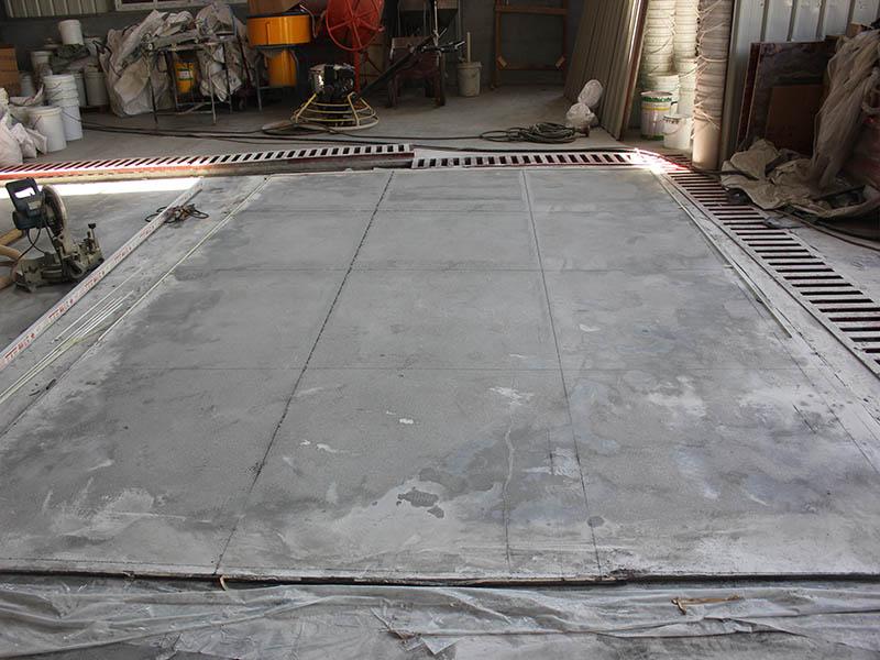 Tank stone floor system 